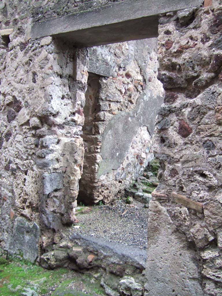 VII.13.14 Pompeii. December 2005. Rear entrance leading to house at VII.13.8.