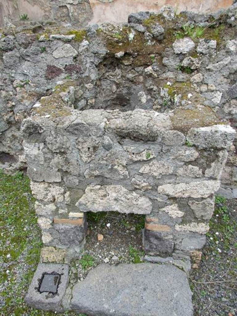 VII.14.5 Pompeii.  March 2009. Room 21.  Kettle with oven under.