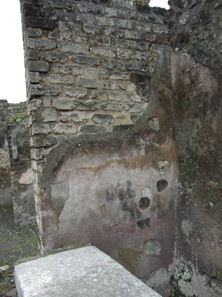 VII.14.5 Pompeii.  March 2009. Room 21.  Wall with plaster.