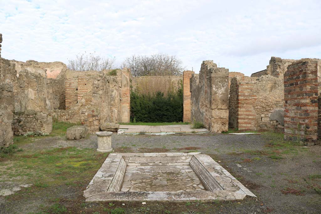 VII.14.9, Pompeii. December 2018. Room 1, looking north across impluvium in atrium. Photo courtesy of Aude Durand.