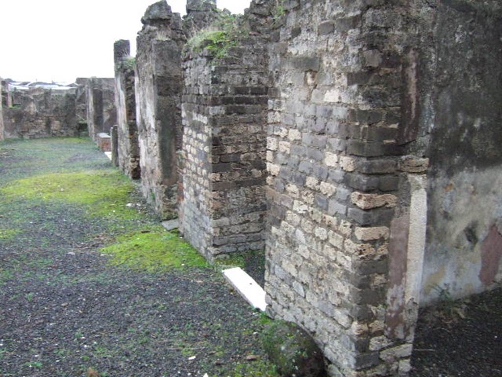 VII.14.18 Pompeii. December 2005. Looking east from entrance along south side.