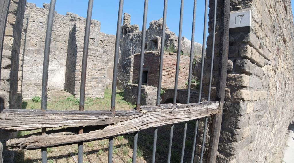 VII.14.19 Pompeii. June 2019. Looking through doorway to kitchen on Vicolo della Maschera. 
Note different number now on entrance doorway. Photo courtesy of Christine Thompson.
