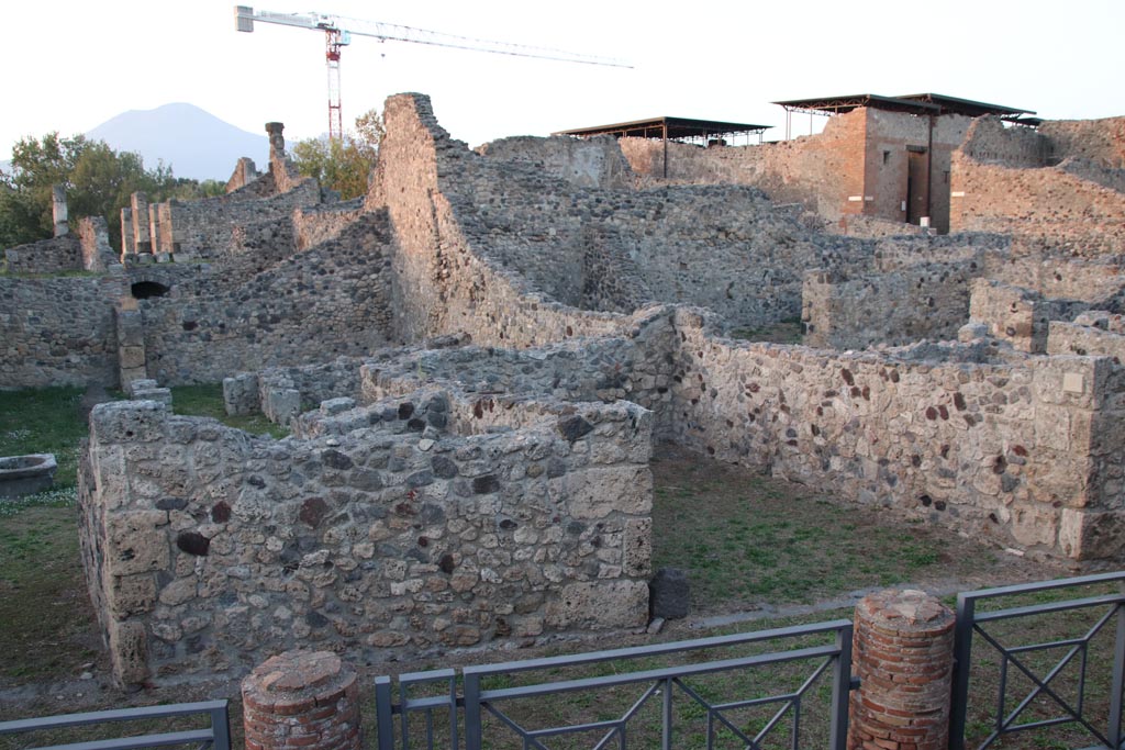 VII.16.1 Pompeii, on left with VII.16.2, on right. October 2023. 
Looking north from Temple of Venus, with shop/bar-room at VII.16.2, on right. Photo courtesy of Klaus Heese.
