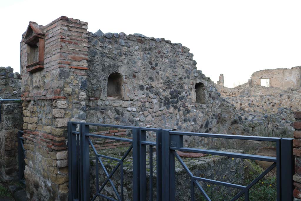 VII.16.7 Pompeii. December 2018. Entrance doorway and pilaster with aedicula niche. Photo courtesy of Aude Durand