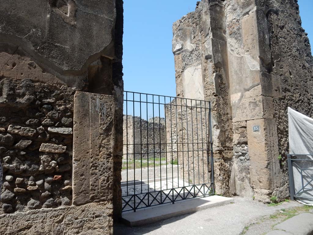 VII.16.13, Pompeii. June 2019. Entrance doorway. Photo courtesy of Buzz Ferebee.
According to Fiorelli –
“Questa aveva ai lati della sua porta, che era preceduta da piccolo vestibolo, due antiche pitture oggi del tutto svanite”.
See Pappalardo, U., 2001. La Descrizione di Pompei per Giuseppe Fiorelli (1875). Napoli: Massa Editore. (p.161).
(translation – “This had at the sides of its doorways, which was preceded by a small vestibule, two ancient paintings today completely vanished.”)
Photo courtesy of Buzz Ferebee.

