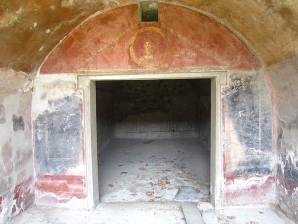 VII.16.17-22 Pompeii. May 2012.  Looking north across room with vaulted ceiling, from peristyle in House of Maius Castricius, with doorway into a rear room. Photo courtesy of Marina Fuxa.
