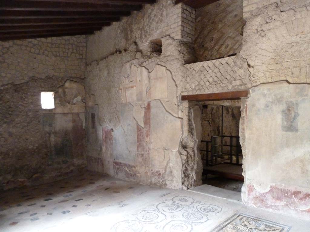 VII.16.a Pompeii. May 2010. Vestibule 8, with doorway to room 6.
The square window in the north wall, on the left, can be seen in the picture below upon excavation.
