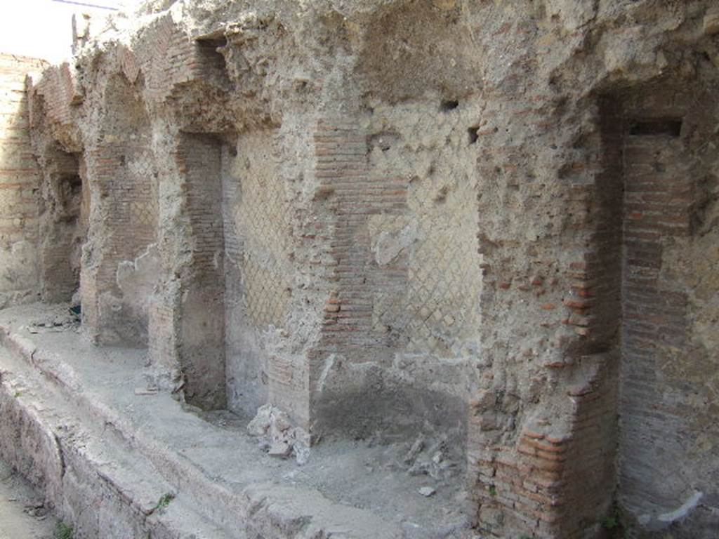 VII.16.a Pompeii September 2005. Room 2, east side of pool wall with alcoves.