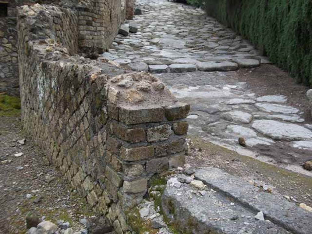 VII.16.a Pompeii. May 2010. Room in south-east corner and doorway to roadway outside, looking east.