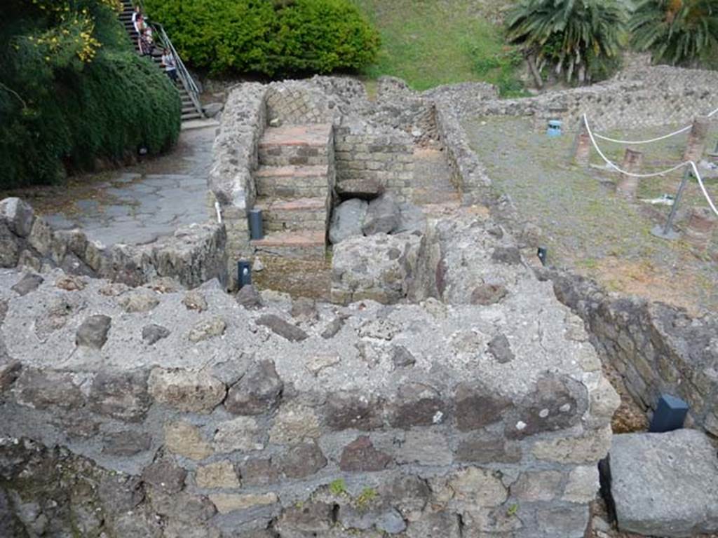 VII.16.a Pompeii. May 2015. Looking west across room 16, with stairs in south-west corner. Photo courtesy of Buzz Ferebee.
