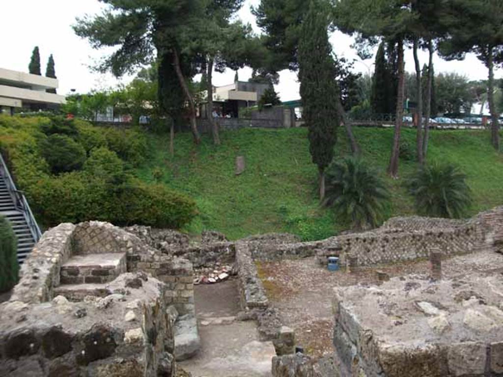 VII.16.a Pompeii. May 2010. Looking west across room 16, with stairs in south west corner.