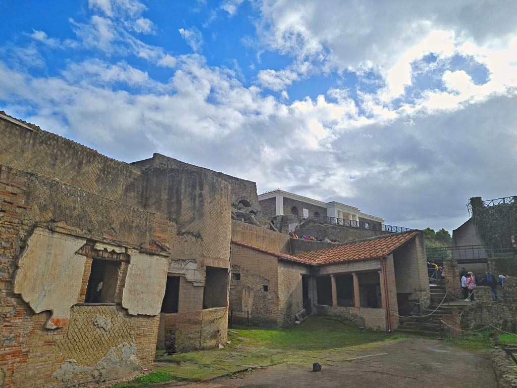 VII.16.a Pompeii. November 2023. 
Looking south-east across east side of courtyard C, with window to room 1, on left. Photo courtesy of Giuseppe Ciaramella.
