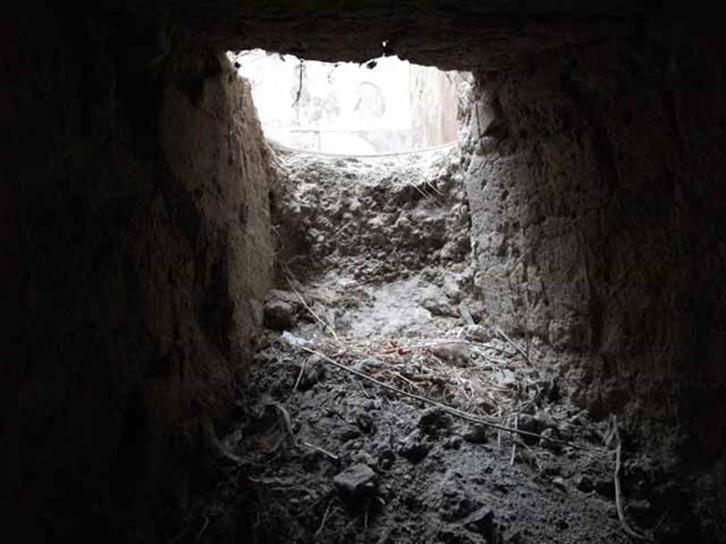 VII.16.a Pompeii. May 2010. Corridor 13, looking through second small window in west wall into room 9, at the rear of the nymphaeum.