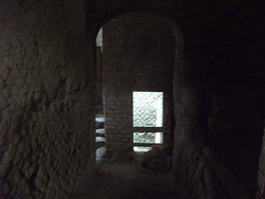 VII.16.a Pompeii. May 2010. Room 11, looking north to end of corridor, and the deep well.