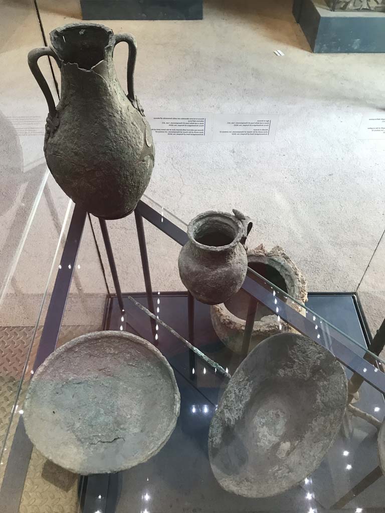 VIII.2.1 Pompeii. April 2019. 
Display case with finds from excavations conducted in the area since the 1930’s.
Photo courtesy of Rick Bauer.
