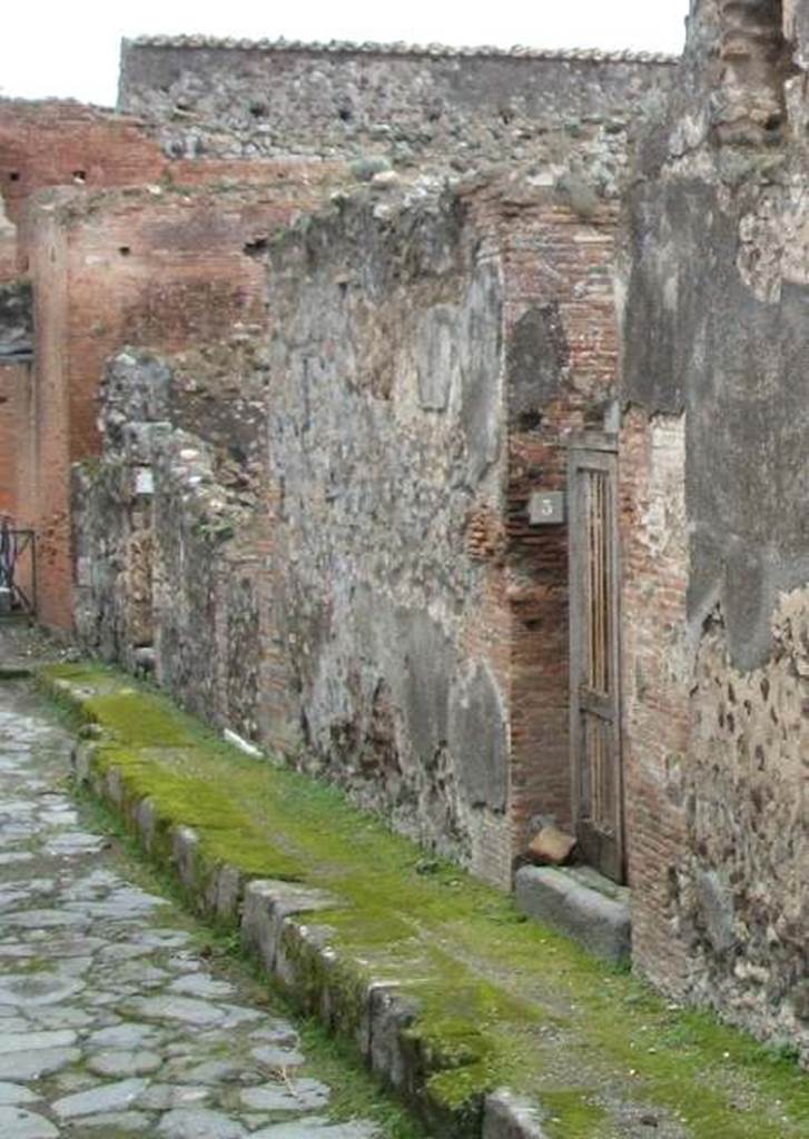 VIII.2.5, VIII.2.4 and VIII.2.3, Pompeii. December 2004. Looking east.