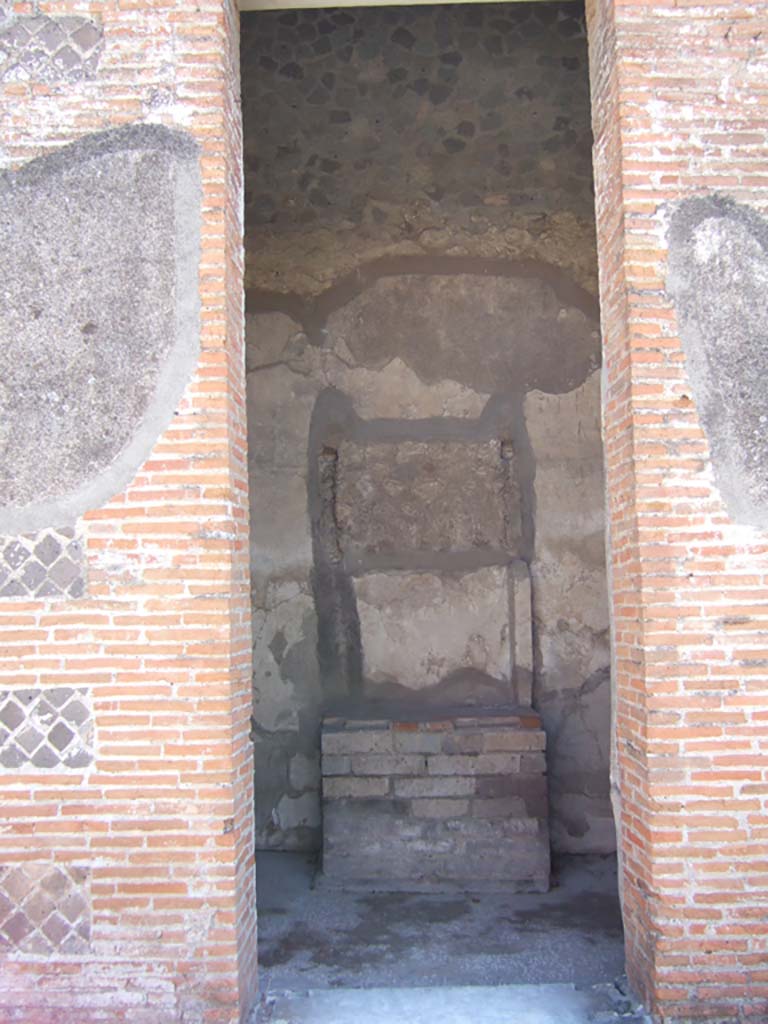 VIII.2.16 Pompeii. September 2005. 
Doorway to room on south side of atrium, with household shrine. 
