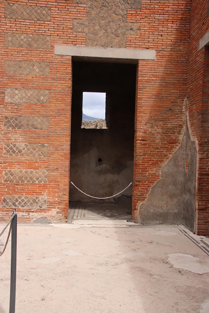 VIII.2.16 Pompeii. May 2024.
Looking north to doorway to room in north-east corner of atrium. Photo courtesy of Klaus Heese.
