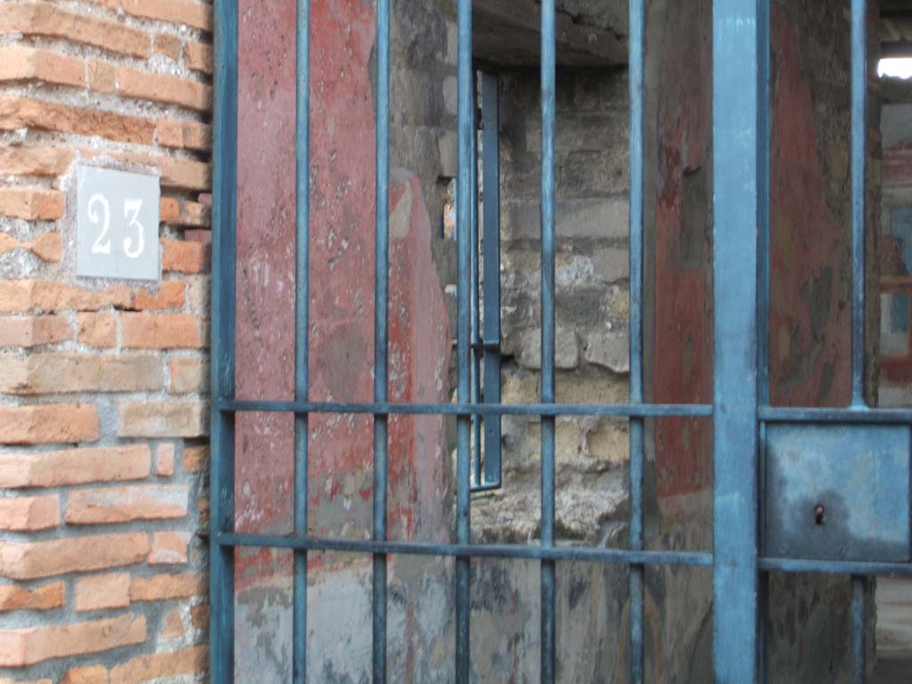 VIII.2.23 Pompeii. December 2004. Entrance doorway and east wall of entrance corridor.