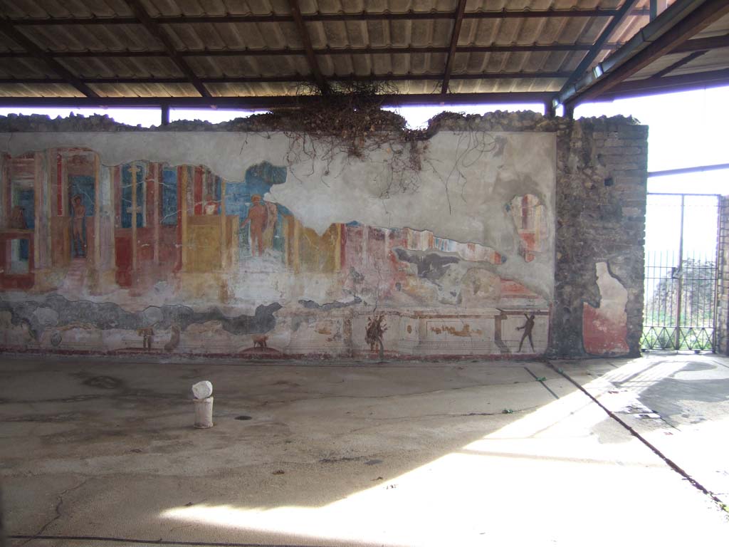 VIII.2.23 Pompeii. December 2005. South wall, west end. At the rear of the south wall was the baths area. 
Found in September 1887, in the furnace-area of the baths were many silver objects, weighing a total of about 3kg, together with wax tablets.
According to Cooley, these were found wrapped in a cloth, and relate to a business deal between two women dating to AD61.
A freedwoman Poppaea Note had borrowed money from Dicidia Margaris.
As security she had temporarily transferred ownership of two slaves to her creditor.
The second tablet [CIL IV 3340] related to the temporary transfer of the slaves.
See Cooley, A. and M.G.L., 2004. Pompeii: A Sourcebook. London: Routledge. (p.169, CIL IV 3340)
