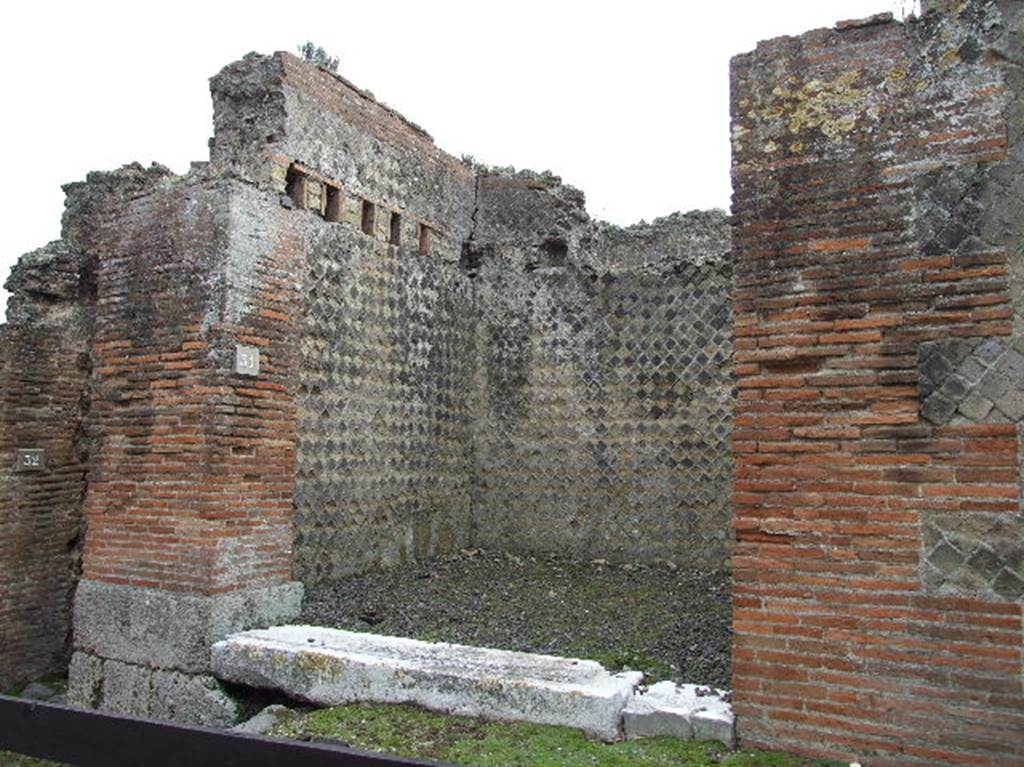 VIII.2.31 Pompeii. December 2005. Entrance doorway of shop, looking towards south-east corner.