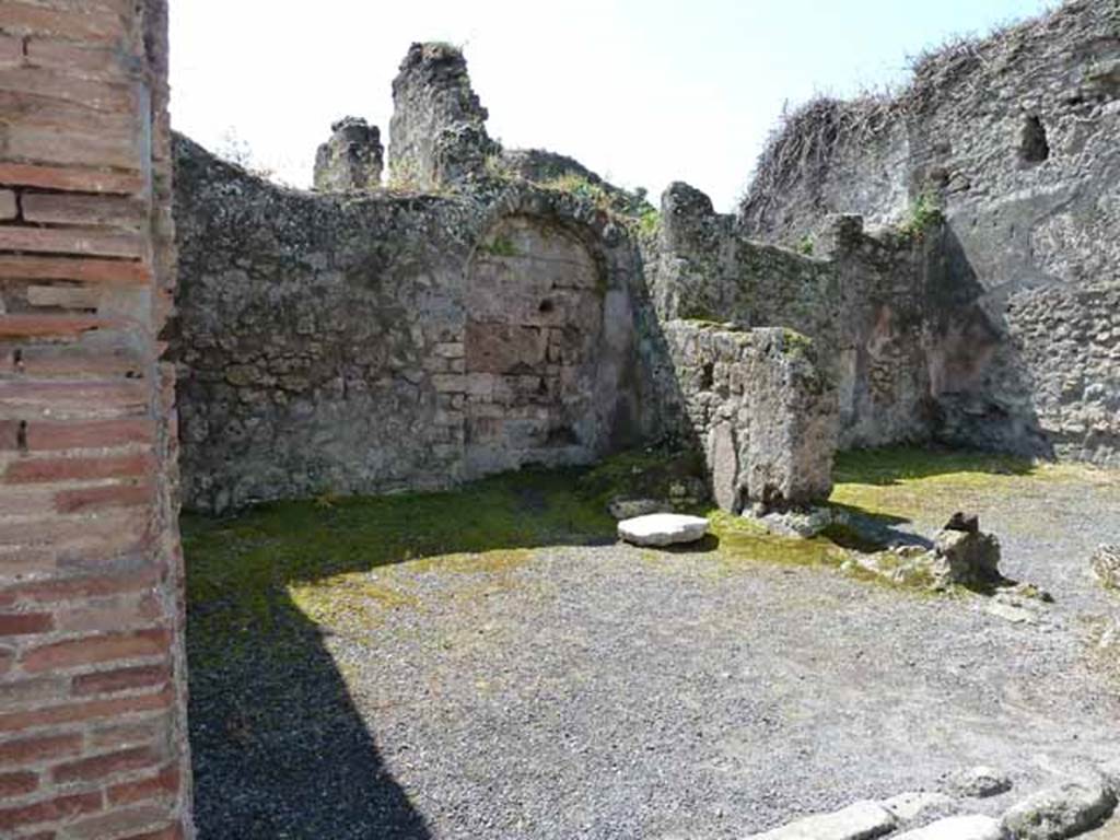 VIII.3.3 Pompeii. May 2010. South wall of shop.