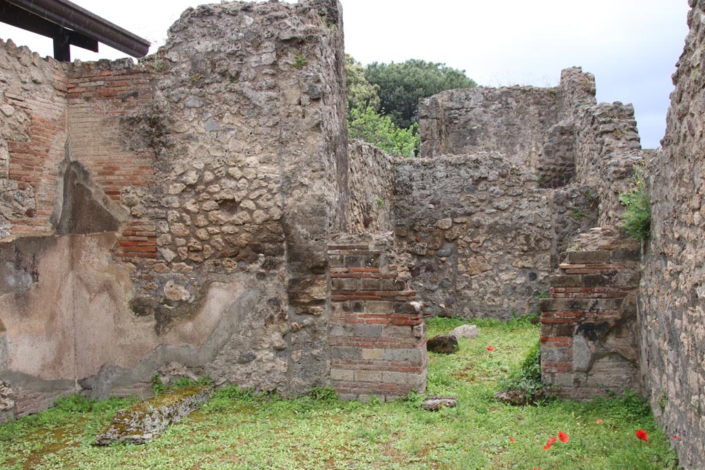 VIII.3.7 Pompeii. May 2024. 
Looking towards doorway to rear room in south wall of shop-room. Photo courtesy of Klaus Heese.
