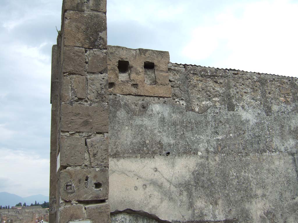 VIII.3.11 Pompeii. May 2006. Upper east wall, in north-east corner.