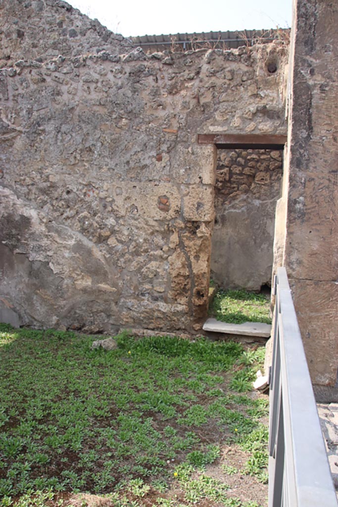 VIII.3.11 Pompeii. October 2023. 
Doorway in west wall in north-west corner, linking workshop to stairs in VIII.3.10.
Photo courtesy of Klaus Heese.
