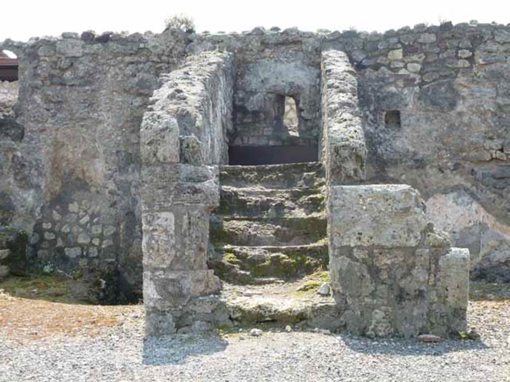 VIII.3.18 Pompeii. May 2010. Steps to upper floor. Taken from VIII.3.19. Looking south.