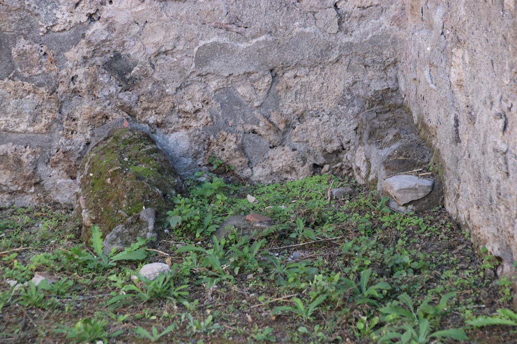 VIII.3.23 Pompeii. October 2022. Possible latrine in south-east corner of rear room. Photo courtesy of Klaus Heese. 

