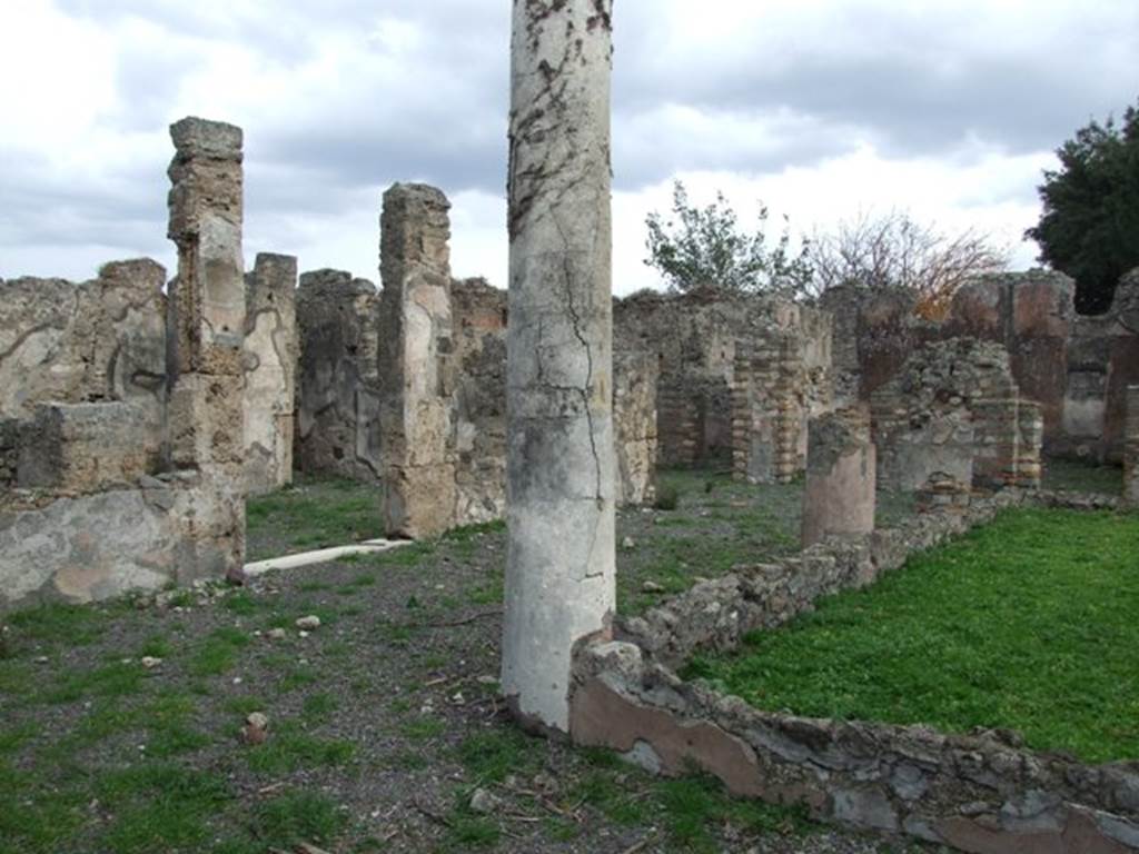 VIII.3.24 Pompeii. December 2007. Looking north-east across peristyle.
In the photo above, the doorway that can be seen right of centre leads to a kitchen and latrine. Found on the plaster facing the hearth, written in faint letters was the graffito –
AELIVS . MAGNVS . PLOTILLAE SVAE
                                      ROGO DOMINA SALVTEM        [CIL IV 1991]
See Pappalardo, U., 2001. La Descrizione di Pompei per Giuseppe Fiorelli (1875). Napoli: Massa Editore. (p.125)
According to Epigraphik-Datenbank Clauss/Slaby (See www.manfredclauss.de) this read as -
Aelius  Magnus  Plotillae  suae
rogo  domina  salutem       [CIL IV 1991]
