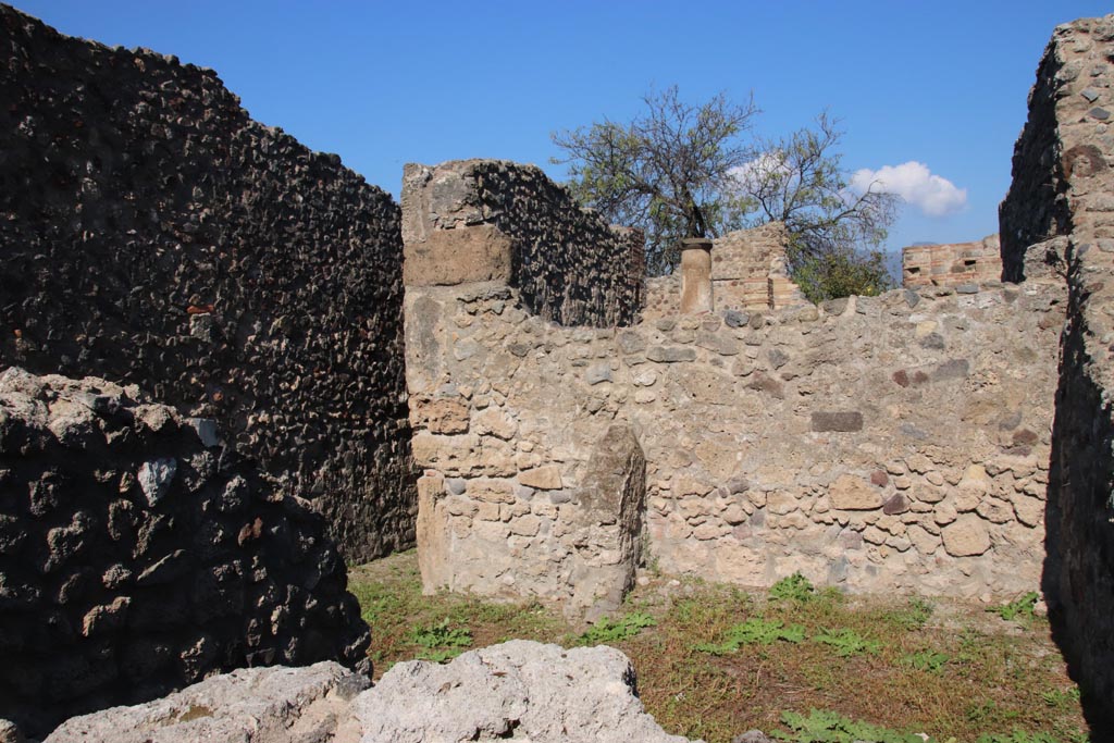 VIII.3.27 Pompeii. October 2022. 
Looking north from room on east side of kitchen, photo taken from VIII.3.24. Photo courtesy of Klaus Heese. 

