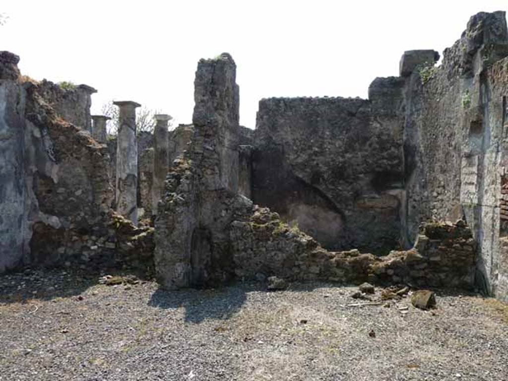 VIII.3.27 Pompeii. May 2010. Looking south from VIII.3.28 towards the small room on the north side of the entrance fauces, and to the peristyle.