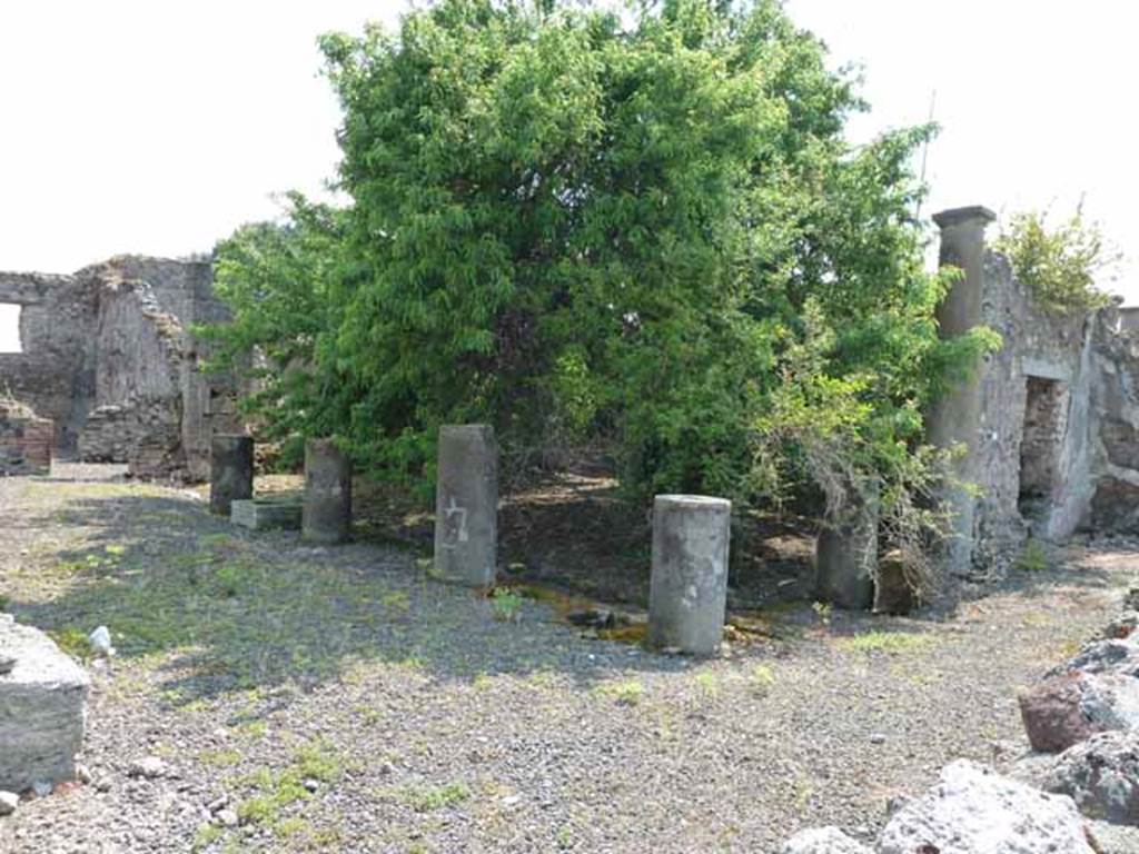 VIII.3.31 Pompeii. May 2010. Looking from the north-west corner of the portico across the peristyle. Taken across the wall of VIII.3.29.
