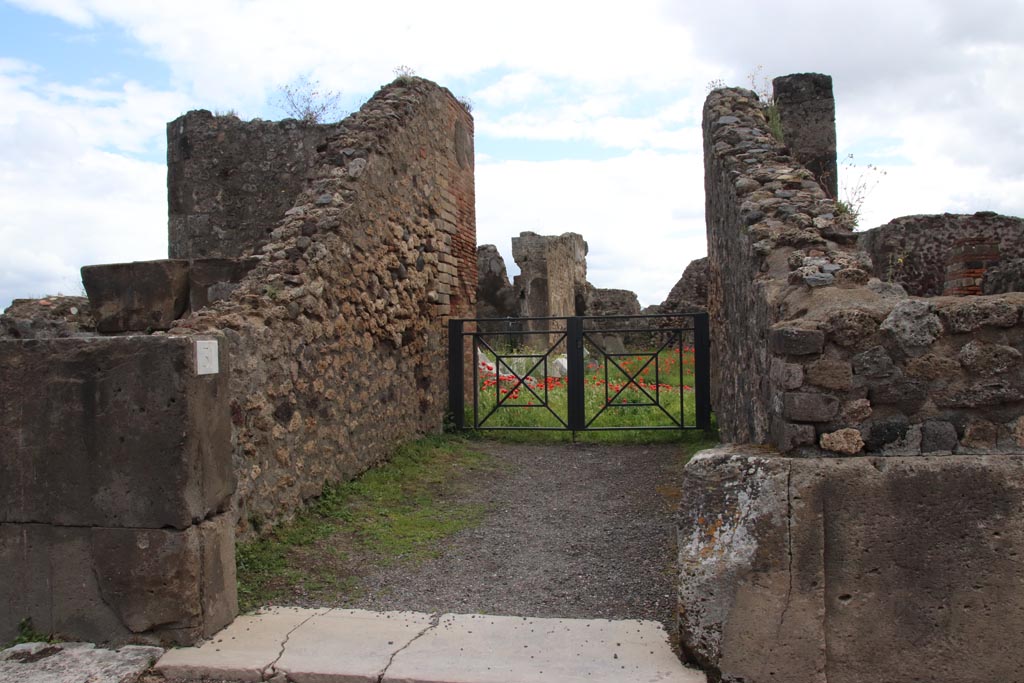 VIII.3.31 Pompeii. May 2024. Looking east towards entrance doorway on Via degli Scuole. Photo courtesy of Klaus Heese.