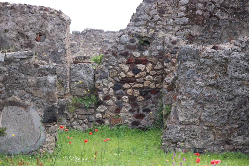 VIII.3.31 Pompeii. May 2024. Looking towards east wall of tablinum with doorway into a rear room. Photo courtesy of Klaus Heese.