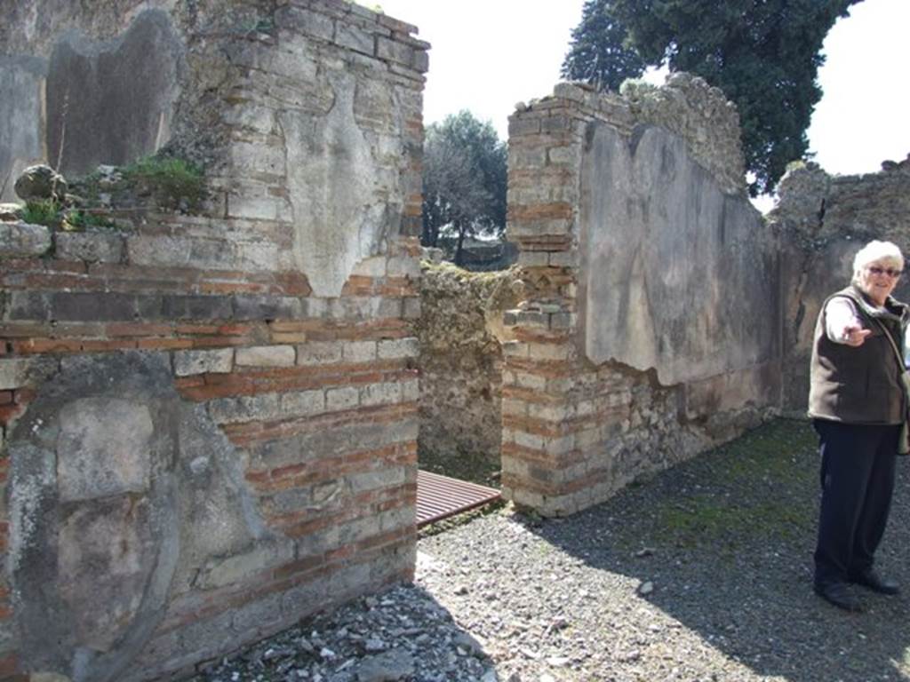 VIII.4.4 Pompeii. March 2009. Doorway to room 12 on south portico.

