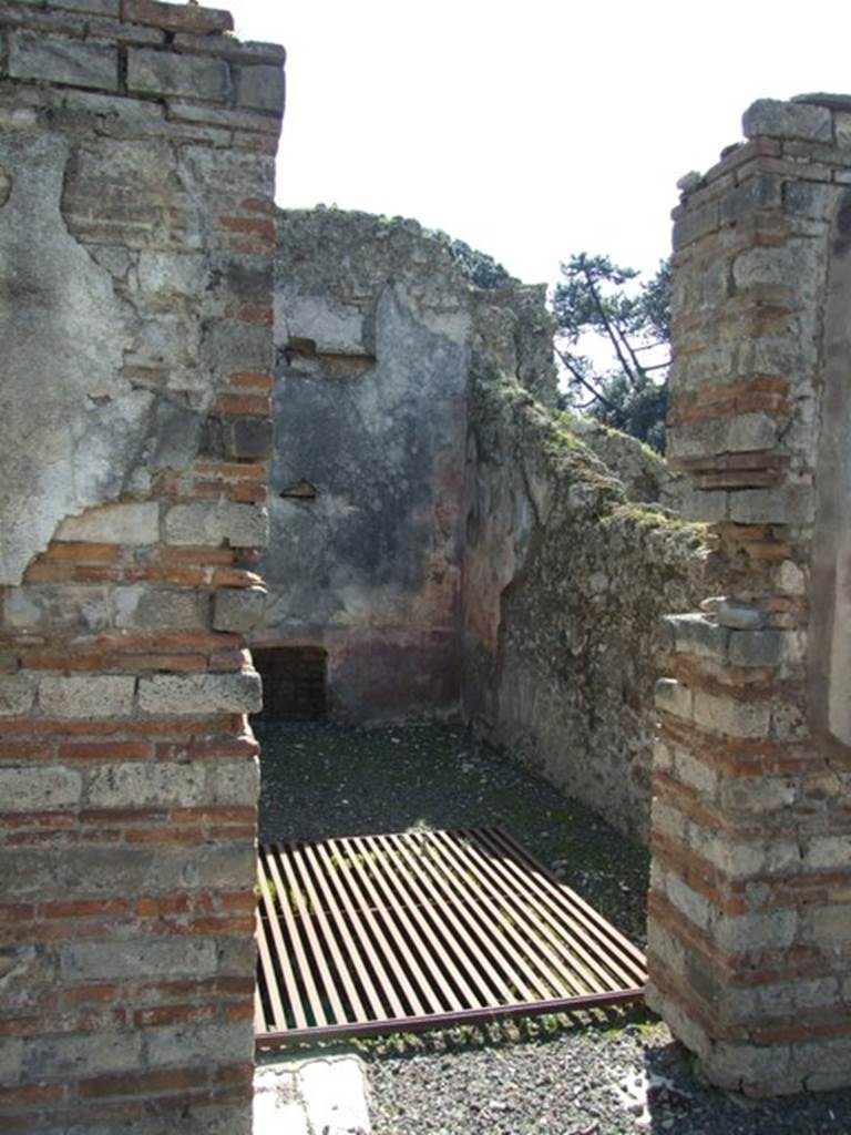 VIII.4.4 Pompeii. March 2009. Doorway to room 12, looking south. According to Helbig, this room contained the following paintings: Europa (128), Light Gods? (964) and Nereide (1030)
See Helbig, W., 1868. Wandgemlde der vom Vesuv verschtteten Stdte Campaniens. Leipzig: Breitkopf und Hrtel.
