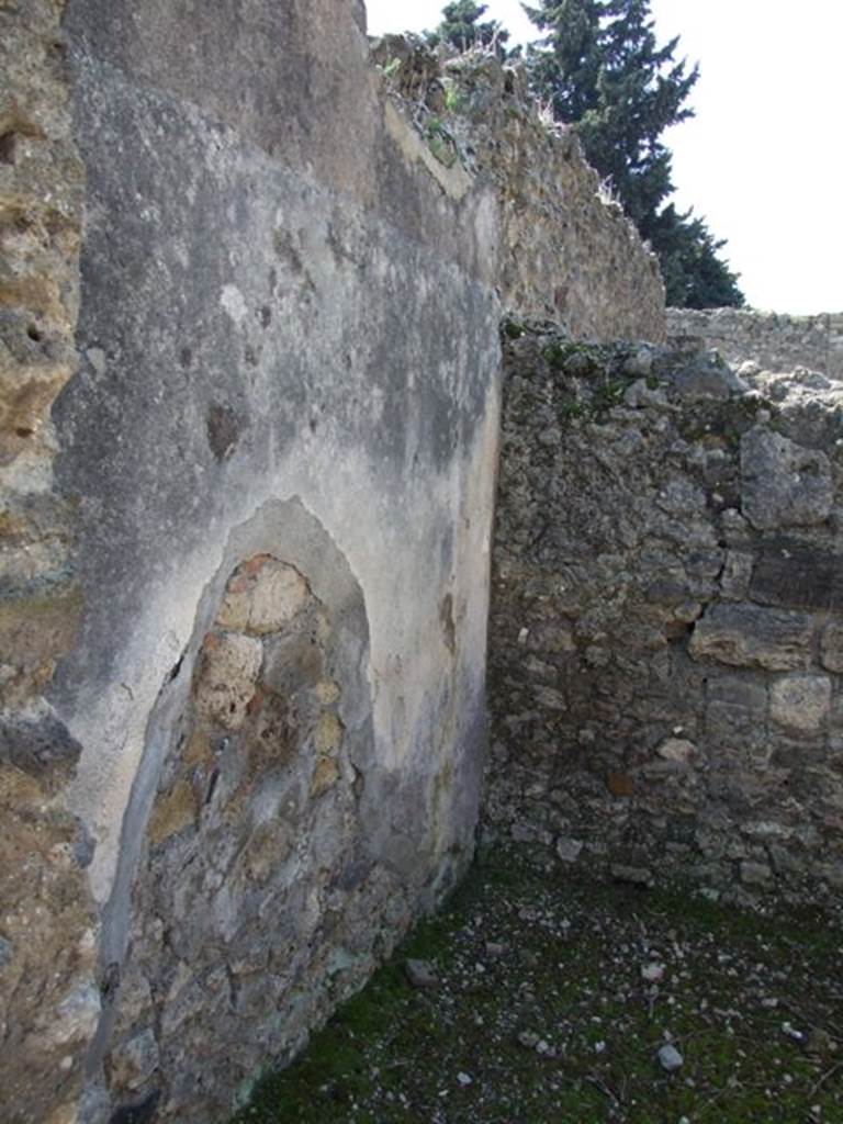 VIII.4.4 Pompeii.  March 2009.  Room 15.  South west corner, with remains of wall plaster.