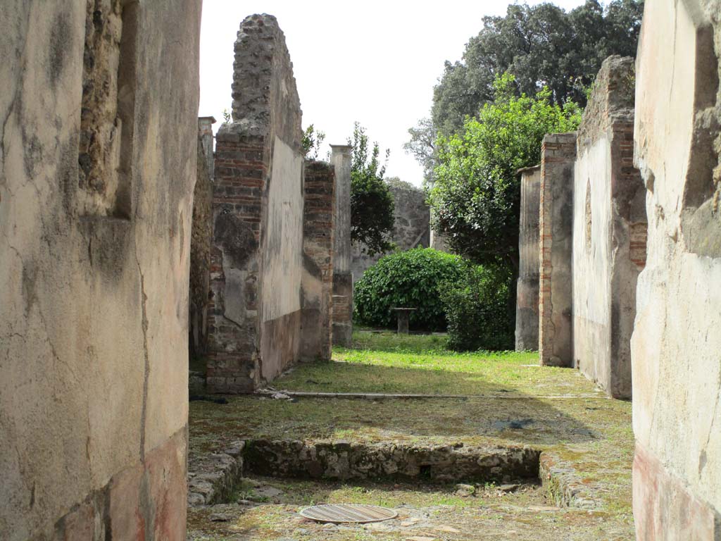 VIII.4.4 Pompeii. April 2019. Room 20, tablinum, looking south across atrium from entrance corridor. Photo courtesy of Rick Bauer.
