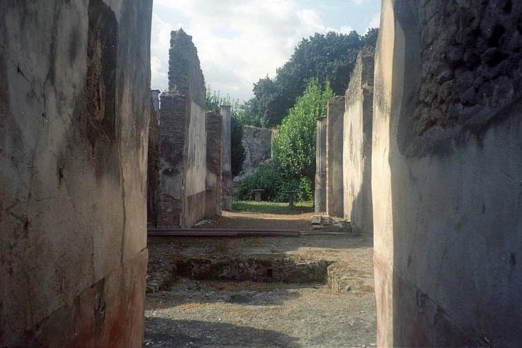 VIII.4.4 Pompeii. July 2011. Looking south through fauces, across atrium, through tablinum, to peristyle. Photo courtesy of Rick Bauer.