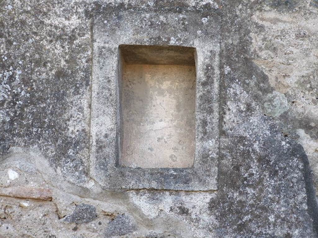 VIII.4.5 Pompeii. December 2006. Niche in south wall of shop. Boyce described this niche as a small rectangular niche adorned with an aedicula faade. 
See Boyce G. K., 1937. Corpus of the Lararia of Pompeii. Rome: MAAR 14. (p.76) 
