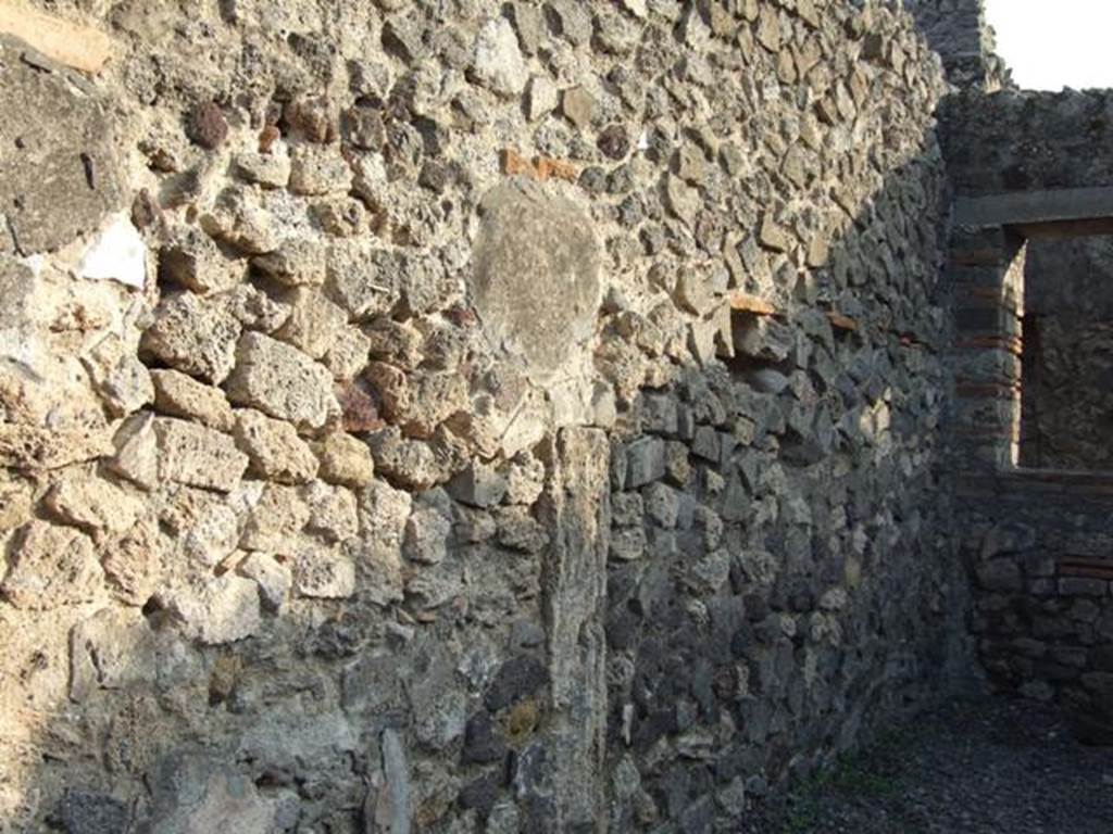 VIII.4.10 Pompeii. December 2007. East wall of shop.