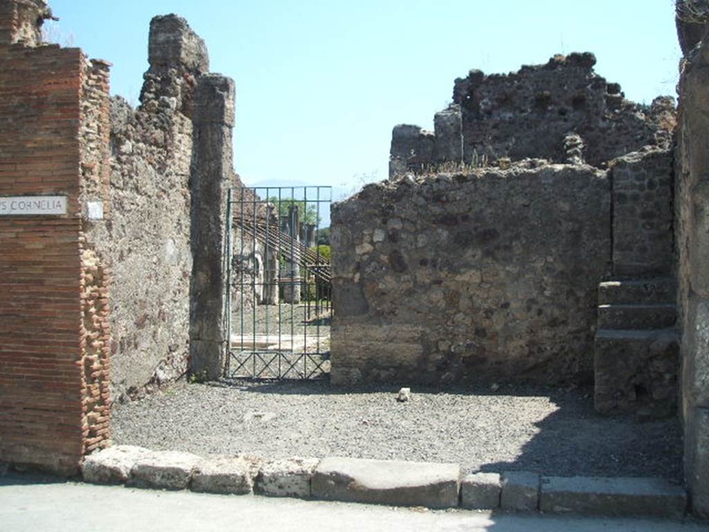 VIII.4.14 Pompeii. May 2005. Entrance, looking south towards doorway into atrium of VIII.4.15.