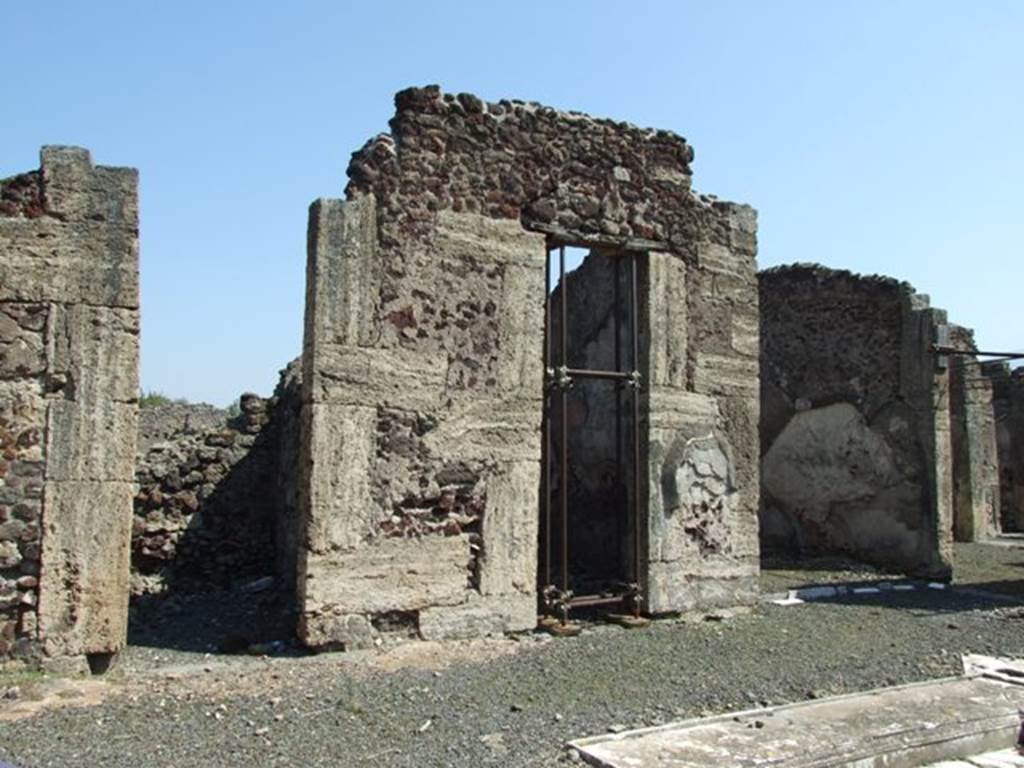 VIII.4.15 Pompeii. March 2009. Room 1, atrium. East side, with doorways to rooms 2, 3 and 4.
