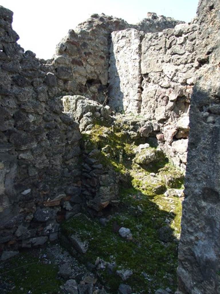 VIII.4.15 Pompeii. March 2009. Room 10, steps to upper floor, built against the north wall.