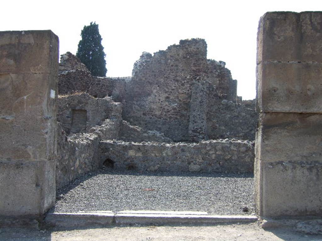 VIII.4.18 Pompeii. September 2005. Entrance on Via Stabiana.
Found in May 1853, painted on the pilaster, on the left, between VIII.4.19 and 18, were 

M(arcum)  Holconium
Priscum  aed(ilem)  o(ro)  v(os)  f(aciatis)  [CIL IV 981]

Sabinum  [CIL IV 982]

A(ulum) Vettium Felicem
aed(ilem) Ioi(...)ius rog(at) [CIL IV 983]

See Pagano, M. and Prisciandaro, R., 2006. Studio sulle provenienze degli oggetti rinvenuti negli scavi borbonici del regno di Napoli. Naples : Nicola Longobardi. (p.168)  
