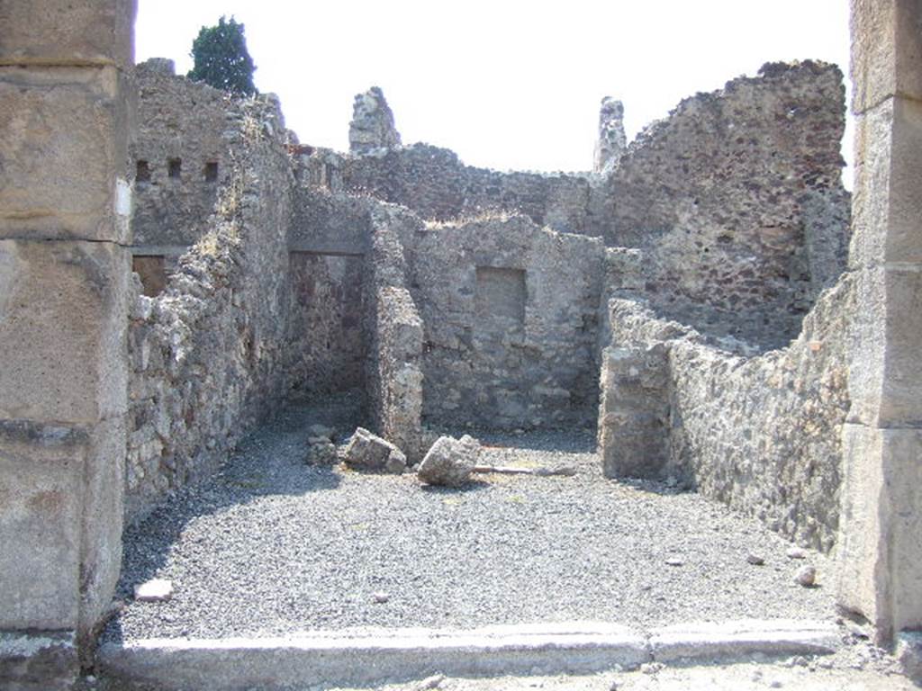 VIII.4.19 Pompeii. September 2005. Entrance on Via Stabiana.
Found in May 1853, painted on the pilaster, on the right, between VIII.4.19 and 18, were 

M(arcum)  Holconium
Priscum  aed(ilem)  o(ro)  v(os)  f(aciatis)  [CIL IV 981]

Sabinum  [CIL IV 982]

A(ulum) Vettium Felicem
aed(ilem) Ioi(...)ius rog(at) [CIL IV 983]

See Pagano, M. and Prisciandaro, R., 2006. Studio sulle provenienze degli oggetti rinvenuti negli scavi borbonici del regno di Napoli. Naples : Nicola Longobardi. (p.168)  

Another painted inscription was found on the faade of either VIII.4.19 or 18. The only readable part was      ..ius rog(at)   [CIL IV 983]
Della Corte wrote that unfortunately this was not enough to give a name, see above.
See Della Corte, M., 1965.  Case ed Abitanti di Pompei. Napoli: Fausto Fiorentino. (p.262)
