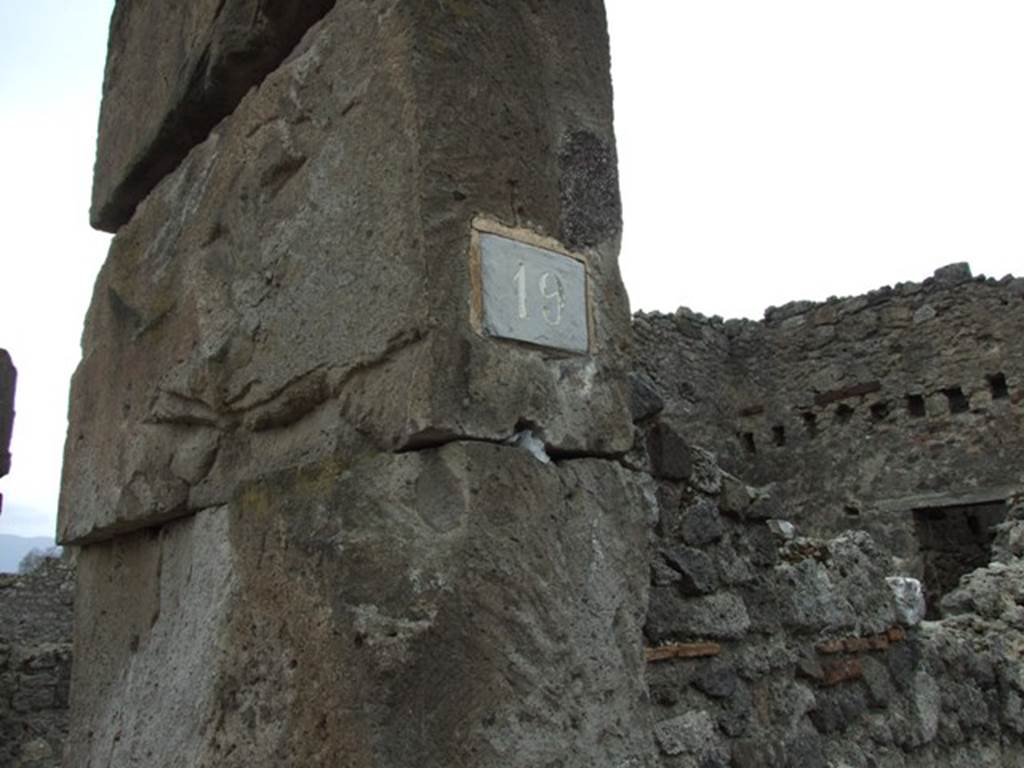 VIII.4.19 Pompeii. December 2007. Entrance pillar between VIII.4.20 and 19 and south wall of shop.